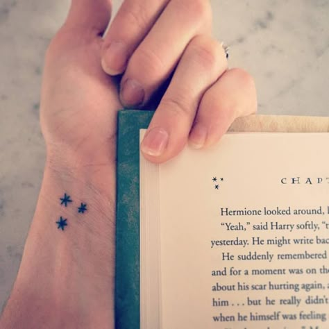 My Harry Potter book star tattoo <3 Harry Potter Chapter Stars Tattoo, Harry Potter Book Stars, Harry Potter 3 Stars Tattoo, Harry Potter Tattoos Stars, Harry Potter Page Stars Tattoo, Harry Potter Book Stars Tattoo, Harry Potter Three Stars Tattoo, Harry Potter Matching Tattoos, Harry Potter Book Tattoo