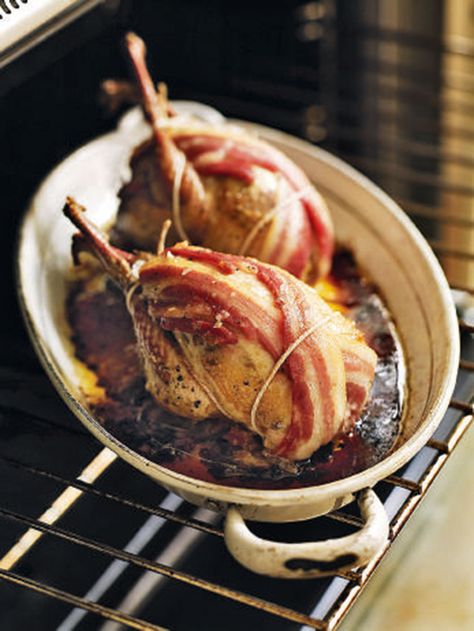 Roast partridge with cider gravy is a delicious winter recipe for frosty days by the fire.  20g butter 4 large fresh thyme sprigs 2 oven-ready partridges 6 rindless dry-cured smoked streaky bacon rashers, 4 left whole, 2 chopped 1 tbsp olive oil 1 small onion, thinly sliced 100ml cider 150ml homemade chicken stock 1 tbsp crab apple and cider jelly (I like Peyton & Byrne, in the Food from Kew range at shop.kew.org) or redcurrant jelly ½ tsp soft butter ½ tsp plain flour Watercress to garnish Partridge Recipe, Winter Season Food, Cider Gravy, Winter Baking Recipes, Quail Recipes, Healthy Winter Meals, Winter Baking, Game Meat, Winter Cooking