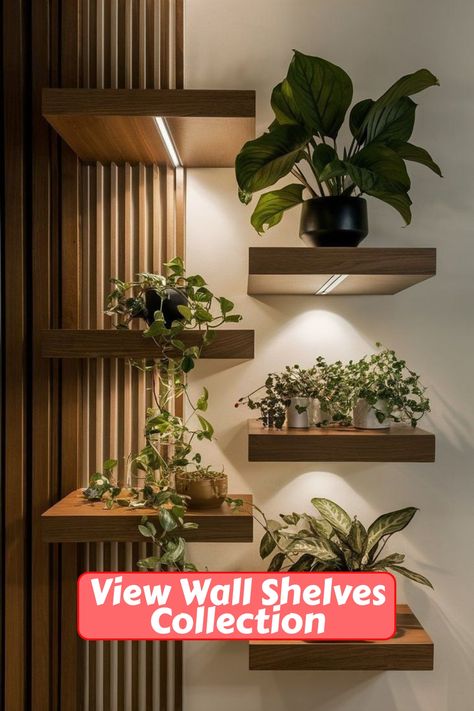 Floating shelves mounted on the wall can hold a variety of plants. They allow for easy arrangement and re-arrangement. Wall Shelf Plants Floating Shelves, Plant Wall For Office, Slat Wall With Moveable Shelves, Slat Wall Floating Shelves, Wood Panel Wall With Shelves, Plants On Wall Shelves, Living Wall Bathroom, Shelves For Plants Indoor, Plant Feature Wall