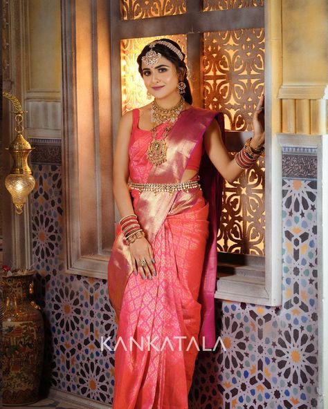 Debaattama Saha looks adorable this Navmi as she drapes herself in our handpicked Dual tone Pink & orange Kanchipuram Silk Brocade Saree from Daivatvam Collection. What makes this weave stand out is the dual tone shade of Pink and orange. The vibrant weave glimmers with gold and silver zari floral brocades over the body. #Daivatvam #9colorsofdivinity #mahagauri #festiveedition #navadurgaseries #weavesofindia #heritageweaves Pink Kanchipuram Saree, Off White Saree, Brocade Saree, The Color Pink, Indian Goddess, Half Saree Designs, White Saree, Kanchipuram Saree, Silk Brocade