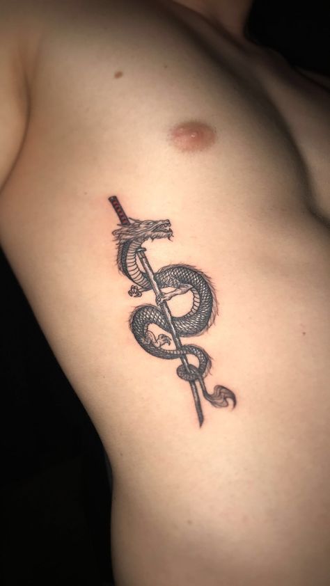 Dragon And Knife Tattoo, Dragon Rib Tattoo Men, Knife Dragon Tattoo, Dragon Knife Tattoo, Knife Tattoos, Martial Arts Tattoos, Tattoo On Ribs, Calf Tattoo Men, Fighter Tattoo