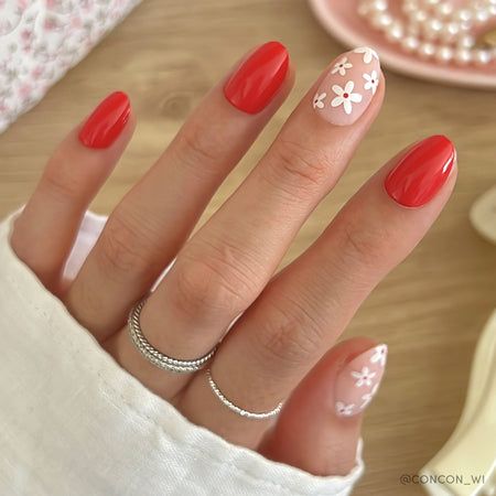 Capture the essence of spring with Red Blossom. These short oval nails combine a glossy red base with matte floral accent nails, delivering a subtle yet chic vibe. Great for casual outings or a stylish work look, this versatile design adds a soft touch of romance with a long-lasting finish.
Key Features
Length: Short
Shape: Oval
Finish: Glossy, Matte
Opacity: Opaque & Semi-Transparent 
Thickness: 0.6mm
Reusable, each wear lasts up to 2 weeks
Waterproof
Customizable
Vegan & Cruelty-free Valentines Day Nails Cute, Trendy Valentines Day Nails, Short Oval Nails, Vday Nails, Love In Bloom, Red Blossoms, Valentine Nails, Valentines Day Nails, Nails Fake