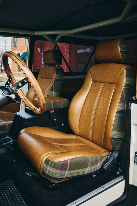 Whiskey leather over Tartan Plaid from Classic Ford Broncos Bozeman Commission Bronco Ii Interior, Plaid Car Interior, Cool Truck Interior Ideas, Classic Truck Interior, Bronco Camping, Old Truck Interior, Old Car Interior, Truck Interior Ideas, Vehicle Upholstery