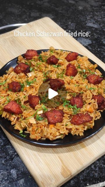 Swapnil Devkar on Instagram: "Chicken Schezwan fried rice 😍
.
.
Here I'm using @triloniumcastiron wok
.
.
#recipe #chickenschezwanfriedrice #friedrice #chickenrice #cooking #cookingvideo #instagram #instagramreels #reels #reelkarofeelkaro #reelitfeelit #reelsinstagram #reelvideo #reelindia #viral #explore #explorepage #_swapnilskitchen_" Chicken Schezwan, Schezwan Fried Rice, Fried Rice, Rice, Snacks, Chicken, On Instagram, Instagram