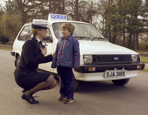 https://flic.kr/p/2nHx7D2 | Recruitment in the 1980s | A Greater Manchester Police officer stops to chat to a child. This image was part of a recruitment campaign from the early 1980s. Her vehicle is the magnificent Austin Metro…a stalwart of police transport in the period. From the collection of the Greater Manchester Police Museum and Archives. You should call 101, the national non-emergency number, to report crime and other concerns that do not require an emergency response. Always call Recruitment Campaign, Manchester Police, Police Women, Greater Manchester, Police Station, Emergency Response, The 1980s, Police Cars, Police Officer