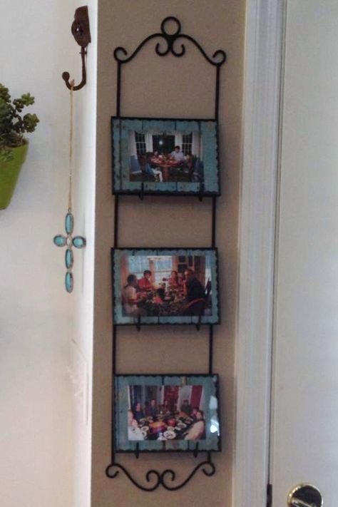 use plate holders to display framed pics Repurpose Plate Holder, State Plates Display, Plate Wall Display Clay, Tole Tray Wall Display, Plate Wall Display Ceramic With Overlap, Wall Plate Holder, Wall Plate Rack, Living Room Country, Farm Furniture