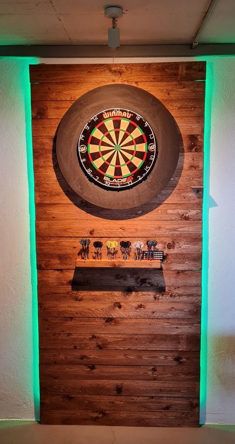 Wood Behind Dart Board, Wooden Dart Board Wall, Home Darts Setup, Electronic Dart Board Wall Ideas, Dart Board Wall Ideas Diy, Dartboard Surround Diy, Dart Board Surround, Modern Dart Board Wall, Dart Room Ideas Man Cave