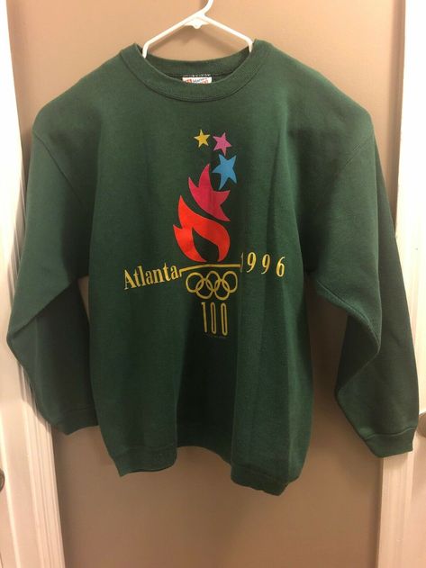 VTG 90S CREWNECK Sweatshirt Large Atlanta Olympics 1996 Graphic Spell Out 50/50 - $25.58. VTG 90s Crewneck Sweatshirt Large Atlanta Olympics 1996 Graphic Spell Out 50/50. Condition is Pre-owned. Shipped with USPS Priority Mail. 233532446019 1996 Olympics, Hoop House, Olympic Training, Atlanta Olympics, Vintage Nike Sweatshirt, 90s Crewneck, 90s Design, Champion Crewneck, Usa Olympics