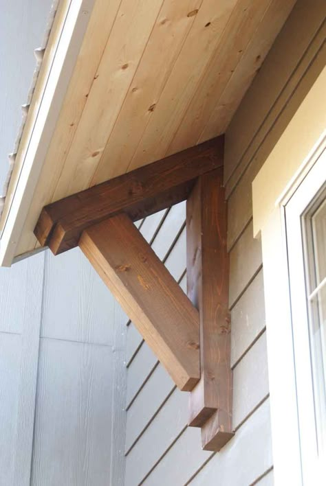 Timber Accents - McLeod Creek Timber Frame Company Diy Wood Awning Over Door, Diy Window Awnings Outdoor, Front Door Overhang Entrance, Roof Over Door, Corbels Ideas, Deck Doors, Window Pergolas, Door Shade, Barn Makeover