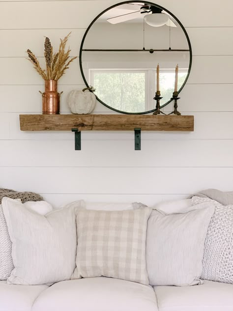 barn beam used as wall shelf Above The Couch Wall Decor, Shelf Above Couch, Couch Wall Decor Ideas, Beam Shelf, Wall Behind Couch, Shelves Above Couch, Decor Above Couch, Above Couch Decor, Couch Wall Decor