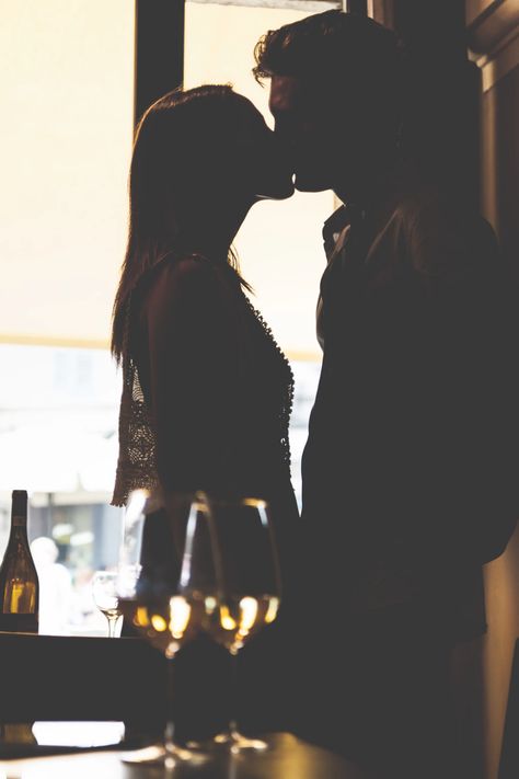 Young lovers kissing in a restaurant. Back lit and foreground blurred. Cheating Spouse, Lovers Kiss, Before Marriage, What I Want, Free Stock Photos Image, Happy Marriage, Fashion App, Want You, Real Life Stories