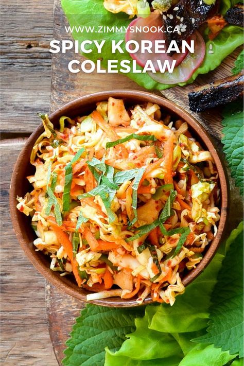 A top down image of spicy Korean coleslaw in a wooden bowl. Spicy Asian Coleslaw Recipe, Side Dishes For Korean Short Ribs, Sides For Korean Short Ribs, Korean Ribs Side Dishes, Korean Coleslaw Recipe, Kimchi Coleslaw, Korean Coleslaw, Side Dishes For Ribs, Spicy Coleslaw