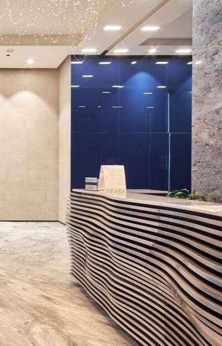 Floating Reception Desk, Reception Desk Design Entrance, Curvy Reception Desk, Hotel Reception Design, Rock Reception Desk, Unique Reception Desks, Futuristic Reception Desk, Parametric Reception Desk, Curved Reception Counter