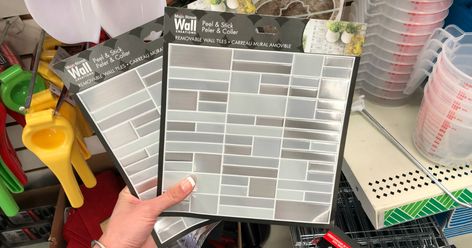 Dollar Tree Sells DIY Peel Dollar Store Peel And Stick Tiles, Dollar Tree Stick On Tile, Dollar Tree Peel And Stick Tiles, Dollar Tree Backsplash Ideas, Dollar Tree Backsplash, Sticky Tile, Peel And Stick Wall Tiles, Tiles Diy, Vinyl Wall Words