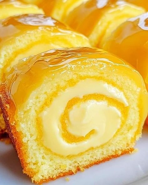 Paula Deen Group | Luscious Lemon Cream Roll Cake with Lemon Glaze  | Facebook Smoked Sausage And Potato Recipe, Optimal Recipes, Sausage And Potato Bake, Cream Roll, African Cooking, Lemon Glaze, Lemon Cheesecake, Roll Cake, Lemon Cream