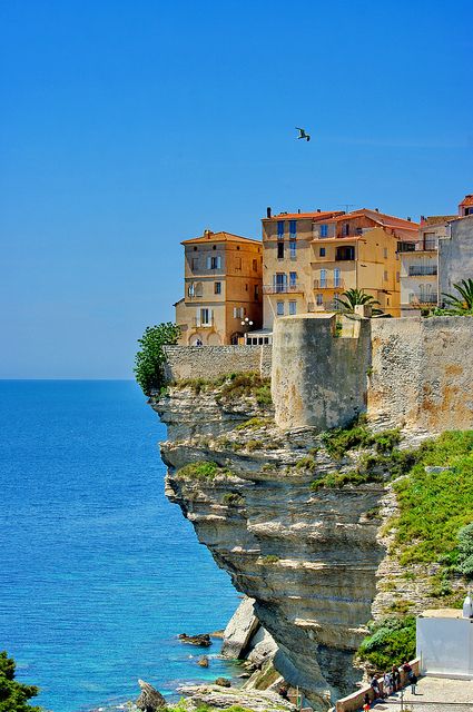 South Corsica, Houses at the edge of the cliff  (rePinned 083013TLK)  real meaning to living life on the edge... Corsica France, Ancient Buildings, The Cliff, Travel Spots, By The Ocean, Travel Stuff, Beautiful Places In The World, France Travel, Special Places