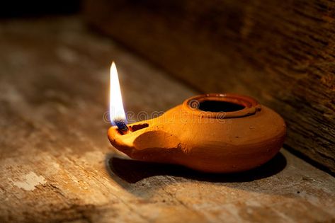 Photo about Ancient Middle Eastern oil lamp on wood background. Image of empty, desert, crimea - 43794038 Warrior Bride, Wood Table Background, Ancient Oil Lamp, Candle Meaning, Christmas Devotional, Open Bible, Rick Warren, Lamp Oil, Salt And Light