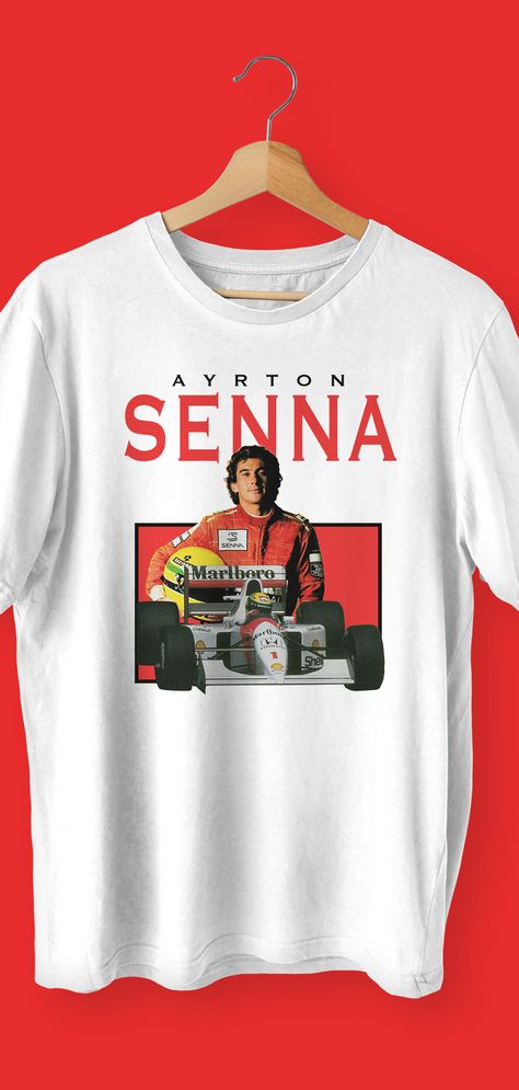 Revive the racing legend with the Ayrton Senna F1 T-Shirt, a tribute to the iconic Formula 1 champion. This meticulously designed tee captures Senna's unparalleled skills on the track. Crafted with premium materials, the Ayrton Senna F1 T-Shirt offers comfort and style. A must-have for fans and collectors, it's the perfect addition to your racing-inspired wardrobe. Stand out and honor the legacy of Ayrton Senna with this timeless piece. #AyrtonSenna #F1 #FormulaOne #RacingChampion #TShirt F1 Tshirt Designs, F1 Shirt Design, F1 T Shirt, Senna F1, Motorsport Clothing, F1 Wag, Wardrobe Stand, Gilles Villeneuve, Tshirt Design Inspiration