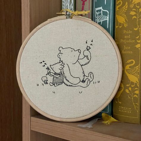 Pooh bear with balloon Modern embroidery fibre art wall hanging Natural linen with black thread, pooh bear and Piglet are hand embroidered on to it. Framed in a wooden hoop which is 5.5 inches high, 5 inches wide and 2.5 cm deep and backed with felt. If you are ordering the embroidery with an added name and date, please leave me a note at check out with the correct name and spelling. Great for adding a touch of character to a space and for adding a personal touch to any room. Especially a Nurser Embroidery Nursery Decor, Pooh Bear Embroidery, Cute Bear Embroidery, Embroidery Bear Pattern, Nursery Embroidery Ideas, Pooh Bear Nursery, New Baby Embroidery, Embroidery For Baby, Winnie The Pooh Embroidery