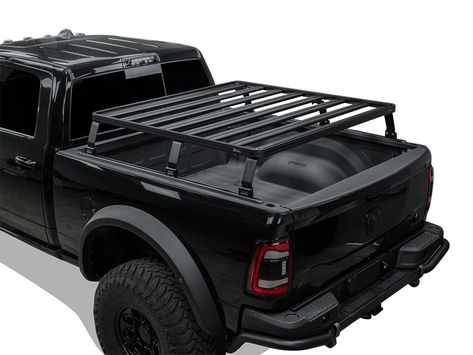 Clear your bed space and still haul your adventure gear and toys over your Ram bed with this Ram 1500/2500/3500 6' 4" (2009-Current) Slimline II Top-Mount Load Bed Rack Kit that installs on top of the side channel of the load bed. Diy Truck Bed Rack, Overland Build, Bulletproof Clothing, Bed Rack, Flatbed Truck, Rock Guard, Truck Beds, Pickup Trucks Bed, Access Panels