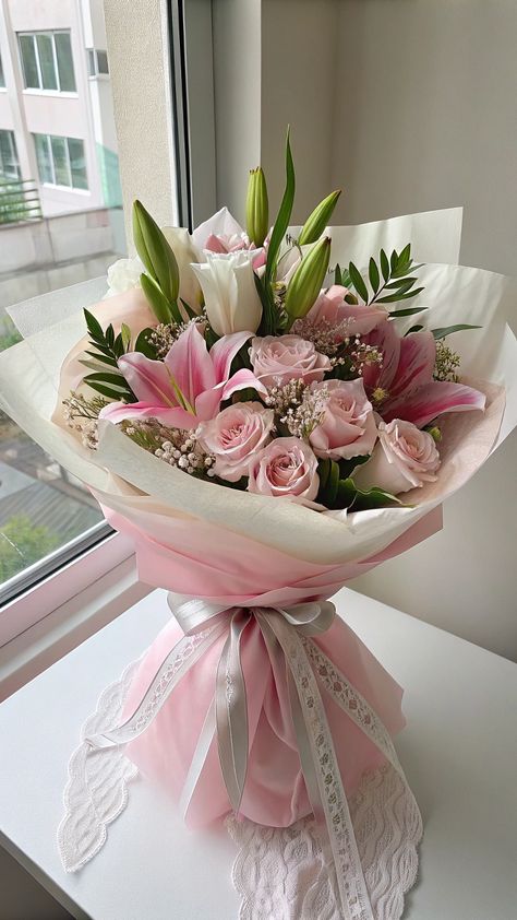 A beautiful birthday flower bouquet featuring a mix of vibrant pink blooms. The bouquet includes lilies, adding a soft touch to the overall arrangement. This design is perfect for birthday celebrations or as part of party flower arrangements. Save this pin for your next birthday flower bouquet or inspiration! Bouquet Of Flowers Design, Pink Bouquet Flowers Birthday, Happy Mother's Day Bouquet Ideas, May Flower Arrangements, Mother’s Day Flower Ideas, Flower Gift Bouquet, Mothers Day Flowers Bouquet Mom, Bouquet For Mom Birthday, Flower Bouquet For Mom Birthday