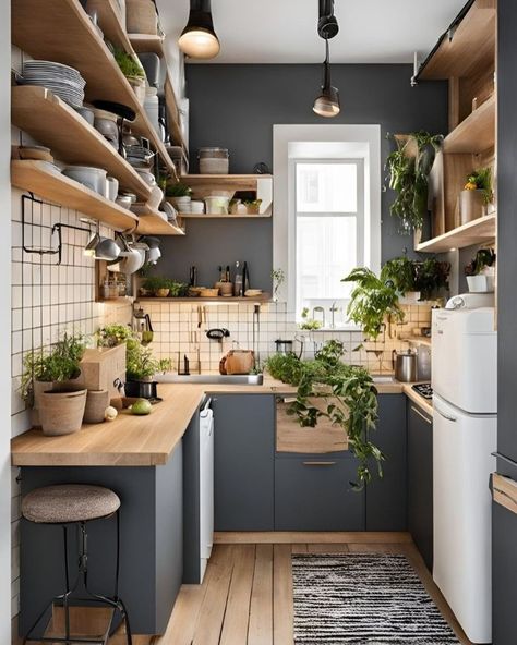 🖤 Dark Boho Kitchen Dreams: Where Edgar Allan Poe Meets Morticia Addams 🍳 Transforming my tiny kitchen into a moody culinary wonderland! Picture this: * Dramatic black cabinets with gleaming brass accents * Classic New York subway tiles for that urban edge * Open shelves showcasing my eclectic collection - glass skulls rubbing elbows with vintage lab beakers 🧪💀 * Shimmering copper pots ready for witchy brews (or just really good pasta) * Lush greenery breathing life into every corner 🌿 It’s a... Tiny Kitchen And Dining Combo, 6m2 Kitchen, Small Clean Kitchen, Extremely Small Kitchen Ideas, Long Kitchen Layout One Wall, Flat Kitchen Ideas, Super Small Kitchen Ideas, Maisonette Ideas, Dark Boho Kitchen