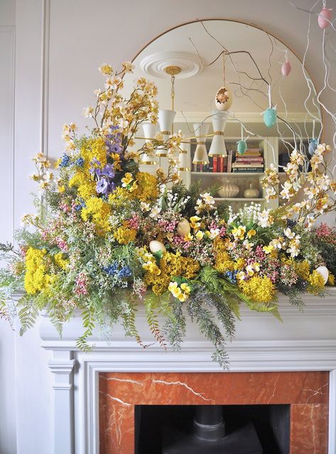 Easter spring mantel decor. how to create a spring mantel garland. Easy home decor holiday season project. Home Floral Installation, Mantel Flowers, Fireplace Mantel Designs, Foliage Decor, Spring Mantle, Spring Mantel, Painted Branches, Easter Door Wreaths, Fireplaces Ideas