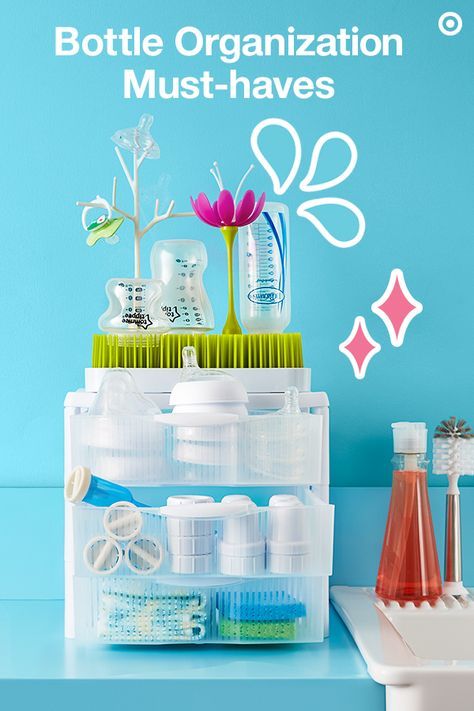 Keep your bottles and all their pieces together with a convenient countertop storage station. Start with clear, stackable storage bins to make finding everything easy. Add Baby’s favorite bottles, like Dr. Brown’s and Tommee Tippee. Both have vent systems and vacuum-free feeding to help with digestion (a must!). Top the bins with the Boon grass drying rack. Add accessories, like flowers and twigs, to add a little more drying space and a whole lot of cute. All are Target Baby Registry must-haves. Bottles Organization, Bottle Organization, Target Baby Registry, Baby Bottle Organization, Baby Bottle Storage, Dr Brown, Baby Storage, Target Baby, Stackable Storage Bins