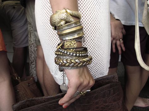 lovely layered bangles.  yvanrodic.com The Bangles, Arm Party, Chunky Bracelets, Arm Candy, Chanel Boy Bag, Bracelet Stack, Gold Bangles, Bling Bling, Wrap Bracelet