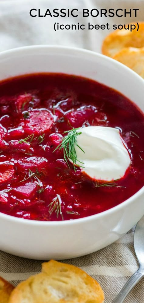 This is a classic Ukrainian Borscht Recipe, just like Mom's. Everyone has fallen in love with this iconic beet soup. We love the deep ruby color of this borsch; so healthy and nutritious. #borscht #borsch #beetrecipes #beetsoup #beets #potatoes #soup #souprecipes #familyfavorites #delicious #recipes Classic Borscht Recipe, Beet Borscht, Beet Soup Recipes, Borscht Recipe, Borscht Soup, Beet Soup, Beet Recipes, Ukrainian Recipes, Bowl Of Soup