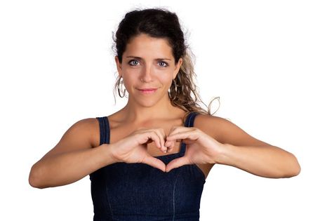 Portrait of young beautiful woman make heart shape with hands in studio. Isolated white background. Love concept. People Doing Heart Hands Pose, Pose Reference Heart Hands, Arm Heart Pose, Heart Arms Pose, Heart Pose Hands, Making A Heart With Hands Pose, Heart Hands Pose, Hands Portrait, Heart Hands