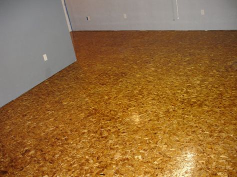 osb flooring stained and varnished | Forum | Archinect Particle Board Floor, Osb Floor, Osb Wood, Inexpensive Flooring, Osb Board, Cheap Flooring, Floor Stain, Modern Flooring, Plywood Flooring