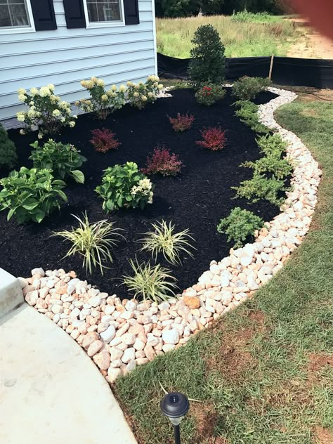 Love the large stone pick Flower Bed With Mulch And Rocks, Stone Flower Beds In Front Of House, Exterior Rock Landscaping, Flower Bed With Rock Border, Rock And Plants Landscaping, Rock Garden Flower Bed Designs, Rocks And Mulch Landscaping, Rock In Flower Bed Landscaping, Stone Flower Bed In Front Of House