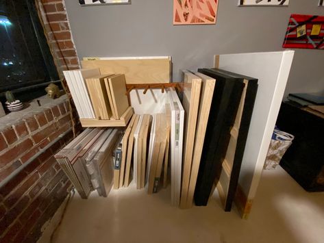 Recently I looked around my studio and realized all of my canvases were taking over the place. They were everywhere and ranging in all sizes. My floors were covered in leaning stacks of blank canvases and all my flat surfaces were hidden by resin paintings that I hadn't yet stored away. Picture Frame Storage Racks, Picture Frame Storage, Diy Storage Building, Resin Paintings, Frame Storage, Multimedia Art, Storage Building, Multimedia Arts, Photography Collage