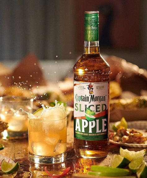 This Apple-Infused Spiced Rum is the Perfect Holiday Sip Captain Morgan Apple Drinks, Captain Morgan Spiced Apple Drinks, Captain Morgan Drinks, Spiced Rum Drinks, Sliced Apple, Banana Rum, Flavored Rum, Apple Drinks, Rum Recipes