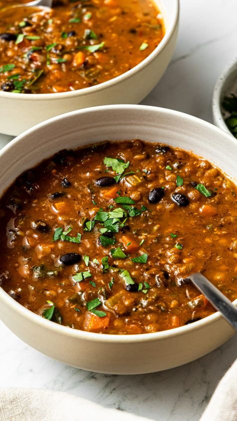 This black bean and lentil soup is packed with nourishing ingredients and is a must-make on cold days! It is perfect for loading up on nutritious vegetables, fiber, and protein. Plus, it's super flavorful and very easy to make. Vegetable Soup Beans, Black Bean And Lentil Chili, Only Veggie Meals, Finish Food Recipes, Lentil Black Bean Chili, Black Bean Mediterranean Recipes, Basic Lentil Soup, Jewish Lentil Soup Recipe, Best Legumes To Eat