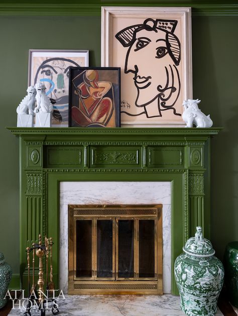 How I'd take this bold and dark green living room by Melanie Turner and simplify the design for the average decor-loving homeowner. Melanie Turner, Traditional Fireplace Mantel, Pollo Tropical, Outdated Bathroom, Dark Green Living Room, Mantelpiece Decor, High Point Furniture Market, Paint Fireplace, Traditional Fireplace