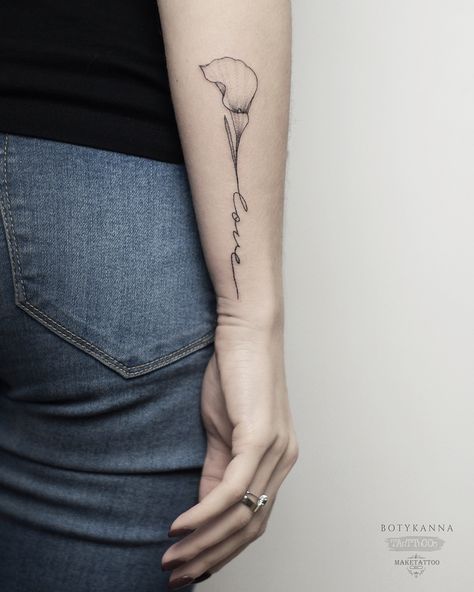 Calla Lily and Word Tattoo by Anna Botyk Calla Lily Spine Tattoo, Cala Lily Flower Tattoos, Dainty Calla Lily Tattoo, Calla Lily Flower Tattoos, Catalilly Flower Tattoo, Callililly Tattoo Calla Lilies, Cali Lilly Tattoo, Calla Flower Tattoo, Cala Lily Tattoos