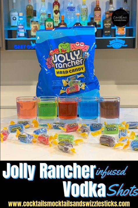 This image shows 5 shots in pink, green, red, blue and purple in front of a bag of jolly rancher candy with jolly rancher candies scattered around. Jolly Rancher Jello, Jolly Rancher Drink, Jolly Rancher Shot, Jolly Rancher Vodka, Layered Shots, Bottle Of Vodka, Candy Shots, Vodka Infused, Jolly Rancher Hard Candy