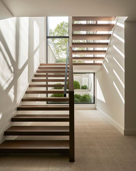 Hastings Residence | Northworks Architects + Planners Large Window Staircase, Window At Top Of Stairs, Staircase Design With Window, Window Stairs Design, Stair With Window, Stairwell With Window, Staircase Window Design Exterior, Staircase Window Design Modern, Window On Stairs