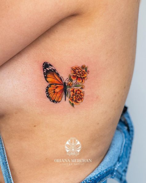 Half Butterfly Half Flower   Insta: @Orimerchan  #tattooartist #tattoolife #MiamiTatto #tattooinspo #butterflytattoos #colortattoo #flowertattoo #ribtattoo #monarchbutterfly #organgebutterfly #orange #sunflower Monarch Butterfly Memorial Tattoo, Monarch Tattoos Butterfly, 3 Monarch Butterfly Tattoo, Marigold And Butterfly Tattoo, Marigold Butterfly Tattoo, Monarch Butterfly Tattoo With Flowers, Small Monarch Butterfly Tattoo, Orange Butterfly Tattoo, 2025 Tattoo