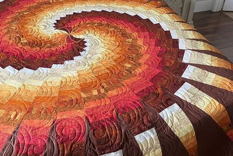 Disappearing Spiral Quilt Spiral Quilt, Bargello Quilt, Bargello Patterns, Rust Color, Hand Quilting, Fall Colors, Written By, Contemporary Rug, Printing On Fabric