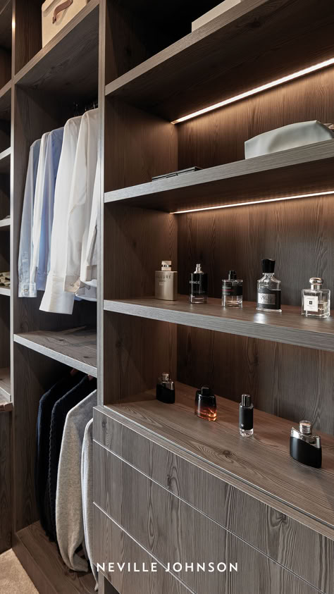 Designed and custom-crafted with luxury in mind, our gloriously stylish men’s walk-in wardrobes are fit for the sharpest of suits, the smartest of shoes and the sleekest of accessories - like this, our latest client case study, showcased in our latest blog.

Guaranteed to help any well-dressed gent maintain their sartorial edge, click the link to learn more about this meticulously masculine closet - and discover how your can begin your own Neville Johnson journey. Men Walk In Closet Ideas, Walk In Closet Perfume Display, Mens Closet Accessories Organization, Dressing Table In Walk In Wardrobe, Man Walk In Closet, Masculine Walk In Closet, Walk In Closet For Men, Men’s Closet Layout, Mens Closet Design