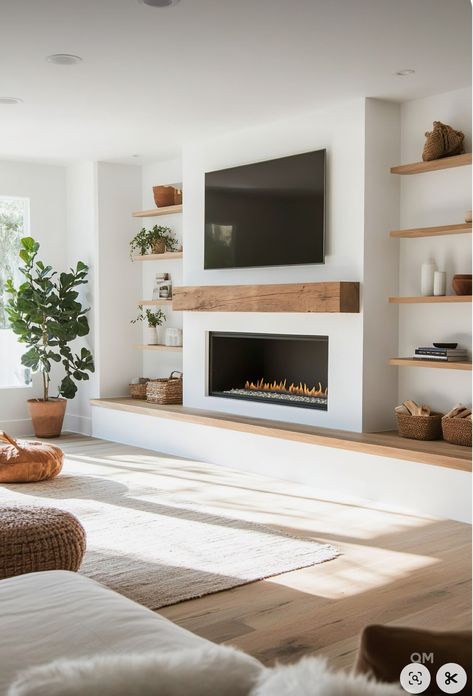 Grand Modern Fireplace, Modern Electric Fireplace With Built Ins, Ways To Hide Sump Pump In Basement, Fireplace Built Ins Small Space, Shelving By Fireplace Floating, Fireplace Bench Ideas, Uneven Fireplace Built Ins, Gas Inset Fireplace Ideas, Small Modern Living Room With Fireplace