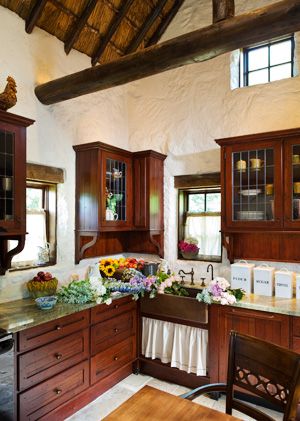 Cottage beauty...An Irish Cottage Moves to Dallas, Stone by Stone - D Magazine Skirted Sink, Irish Cottage Decor, Irish Cottage Interiors, Whitewashed Walls, Irish Cottages, Brown Cottage, Irish Kitchen, Irish Interiors, Country Cottage Interiors