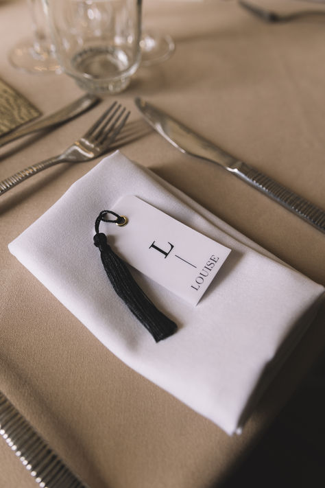 Monochrome wedding place name tag for luxe city wedding with black tassel | wedding place name | wedding decor ideas | wedding tablescape | chic city wedding | Lauren Elliott Photography Black And White Place Setting Wedding, Wedding Menu With Tassel, Name Tag Wedding Table, Monochrome Wedding Decor, Monochrome Wedding, Monochrome Weddings, Black And White Wedding Theme, Black Napkins, Wedding Place Names