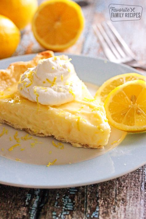 Slice of Sour Cream Lemon Pie on a plate Turnovers Recipes, Sour Cream Lemon Pie, Lemon Sour Cream Pie, Lemon Pie Recipe, Sour Cream Recipes, Lemon Dessert Recipes, Easy Pie, Lemon Pie, Meringue Pie