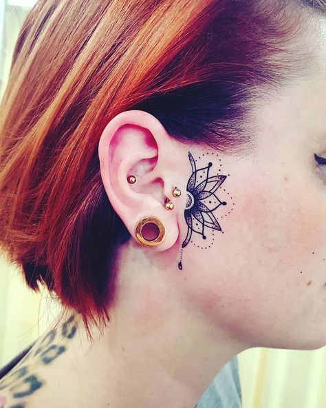 #geometrictattoo #geometric #mandala #mandalatattoo #blackwork #eartattoo #girlswithtattoos #tattooedgirls #inkedgirls #inked #cheektattoo… Face Flower Tattoo, Inner Ear Tattoo, Tato Mandala, Behind Ear Tattoos, Face Tattoos For Women, Throat Tattoo, Face Flower, Pretty Hand Tattoos, Epic Tattoo