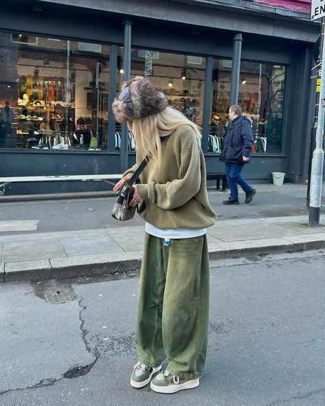 How about her color? 🫛 Outfit info 👇🏻 • • • 📸 @daisybirchalll 🇬🇧 👔Top : runge 👖Bottom : the ragged priest 👞Shoes : clints 👜Bag : carhartt • • • • • • fur bucket hat, light khaki knit, baggy khaki jeans, cross bag, khaki sneakers, women’s outfit, united kingdom Bucket Hat Outfits, Khaki Sneakers, Outfit Info, Fur Bucket, Fur Bucket Hat, Khaki Jeans, The Ragged Priest, Outfits Streetwear, Ragged Priest