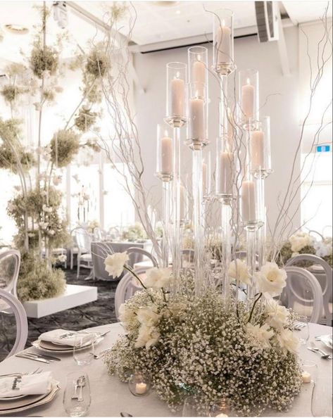 Chandelier Wedding Centerpiece, Clear Candelabra Centerpiece, Candlebra Decor Ideas, Tall White Centerpieces Wedding, Modern Candelabra Centerpiece, White And Blue Wedding Reception, Candlebra Centerpiece, White Wedding Centrepiece, Large Wedding Centerpieces